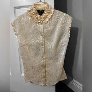 KOEL size small  sleeveless polyester scalloped hem.